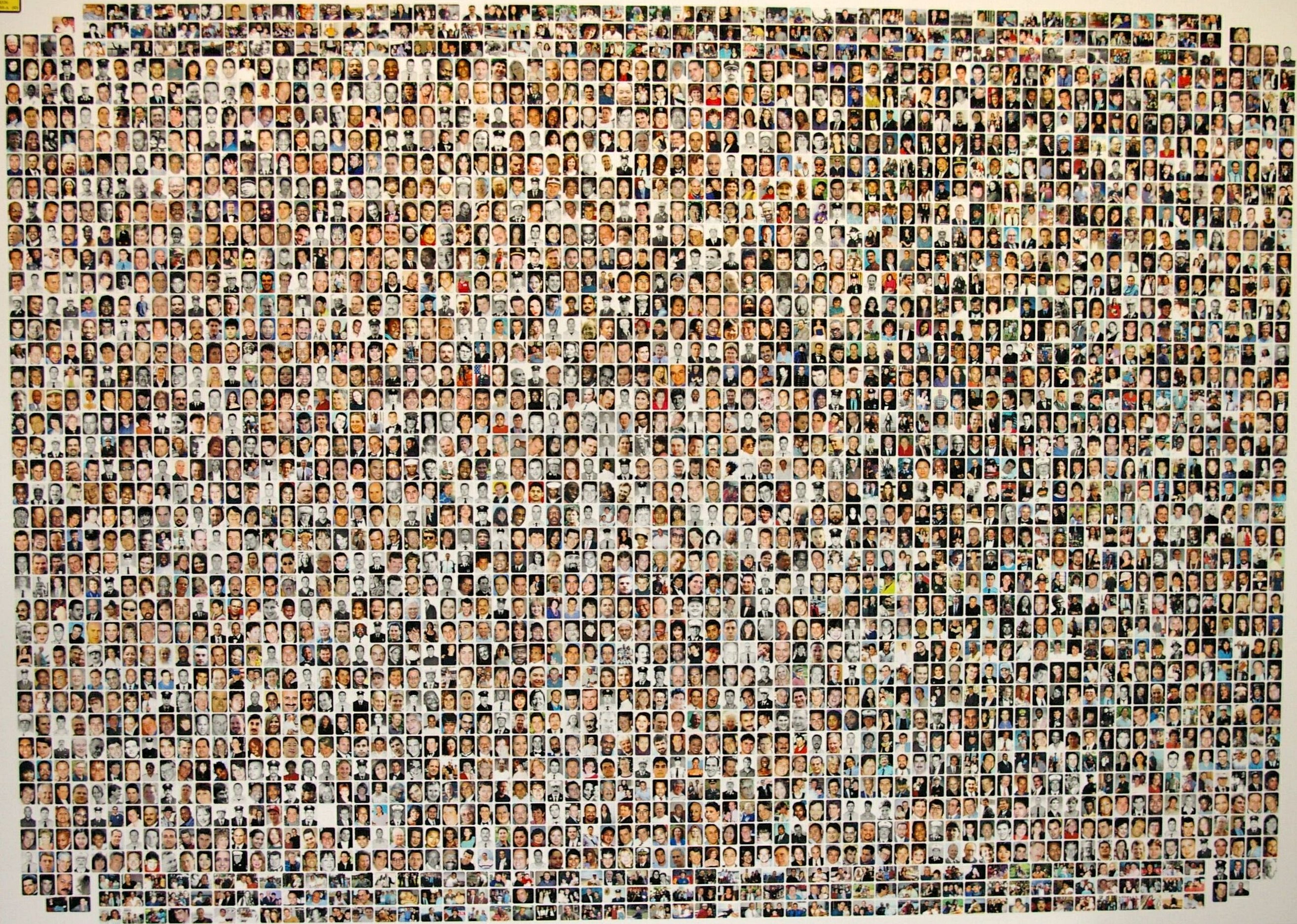 A collection of photographs of those killed (except for 92 victims and terrorists) during the terrorists attacks on September 11, 2001. his image is a work of a United States Department of Justice employee, taken or made during the course of an employee's official duties.